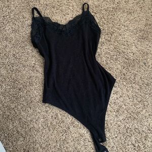 Black lace body suit